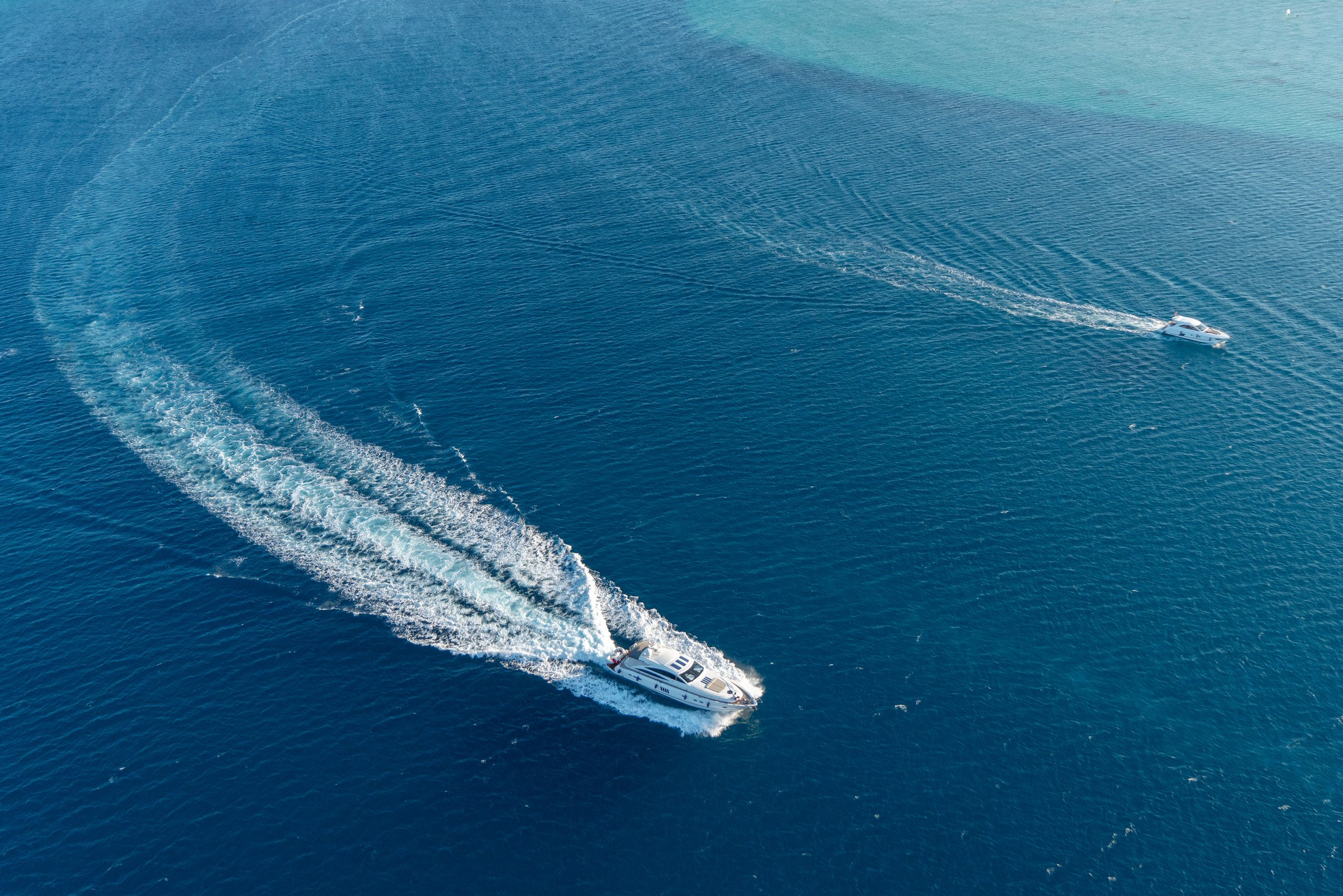 yacht and speedboat